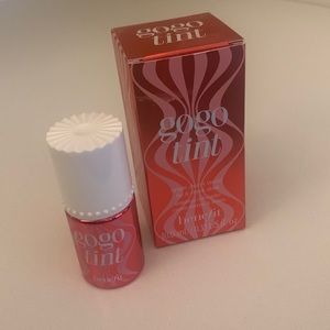 Two bottles of Benefit tinted lip and cheek stain
